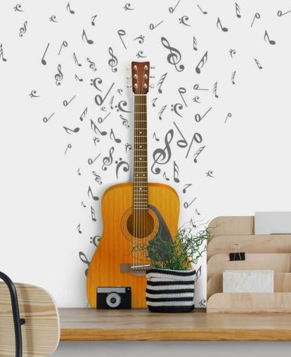 Guitar med sorte noter flyder ud på hvid baggrund vægmaleri