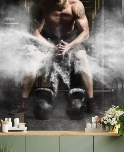 Muscular man workout with kettlebell at gym wallpaper