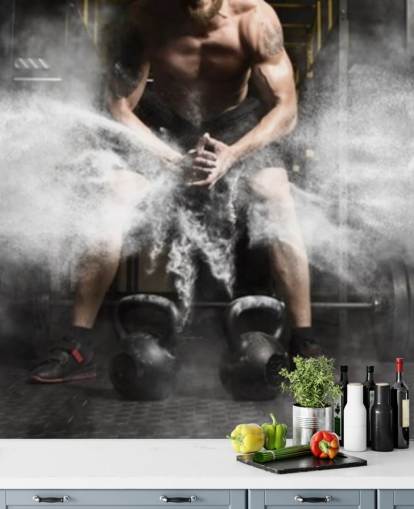 Muscular man workout with kettlebell at gym wallpaper Muscular man workout with kettlebell at gym wallpaper