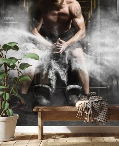 Muscular man workout with kettlebell at gym wallpaper