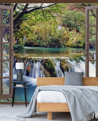 Kleiner Wasserfall vom Fenster aus gesehen Fototapete