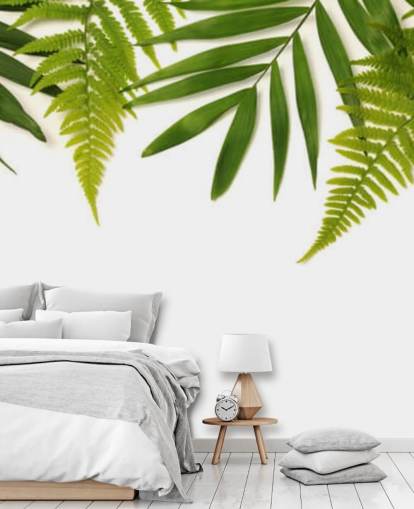 decorazione murale con foglie verdi tropicali su sfondo bianco