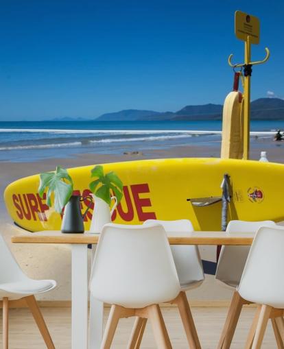 yellow surf rescue board on australian beach wallpaper