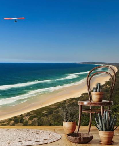 Hang svævefly Flying Over Beach i Byron Bay AU tapet