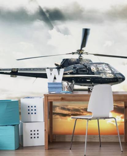 Helicóptero voando ao pôr do sol