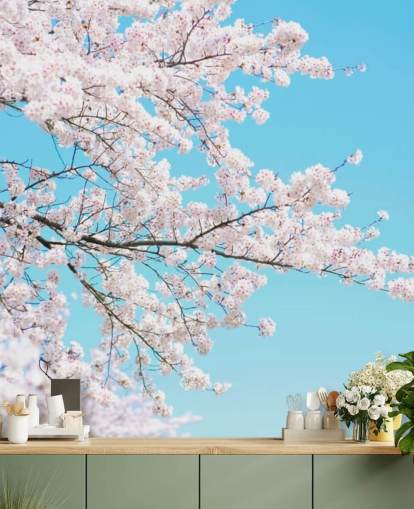 Papier Peint Fresque Fleurs roses contre un ciel bleu éclatant