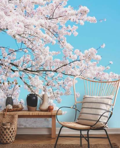 Pink Blossom tegen een felblauwe luchtmuurschildering Pink Blossom tegen een felblauwe luchtmuurschildering