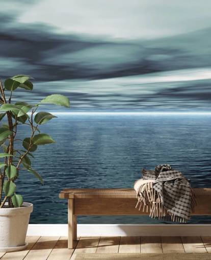 Bewolkte grijze lucht en kalme oceaanbehang Bewolkte grijze lucht en kalme oceaanbehang