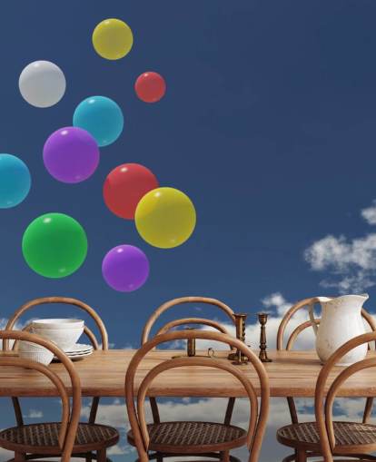 Decorazione murale con palloncini colorati contro il cielo blu