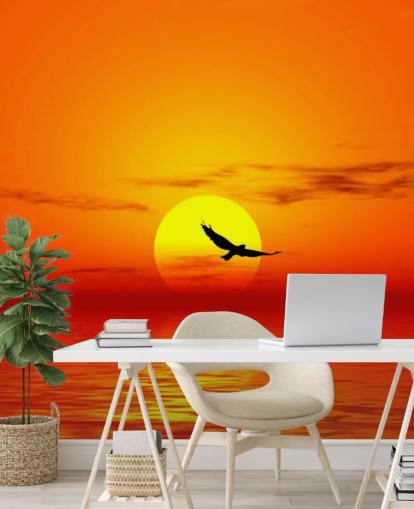 Bird Flying Over Ocean at Sunset Wall Mural