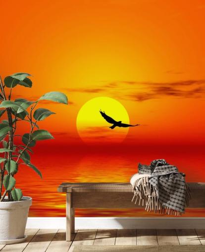Bird Flying Over Ocean at Sunset Wall Mural