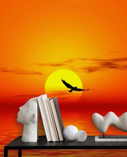 Bird Flying Over Ocean at Sunset Wall Mural