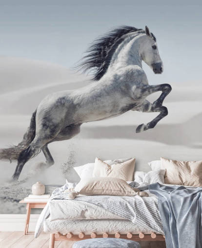 Leaping White Horse in Snowy Landscape Wallpaper