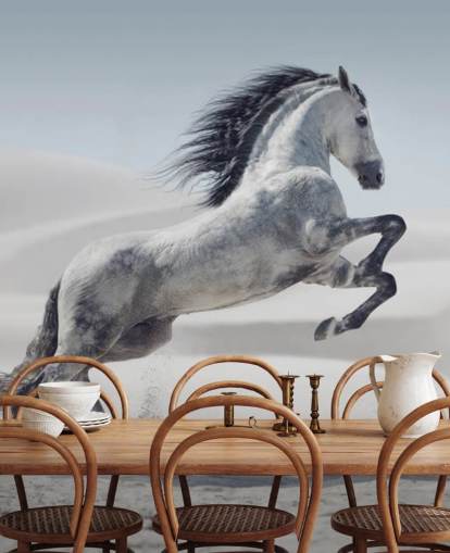 Fond d'écran Cheval blanc bondissant dans un paysage enneigé