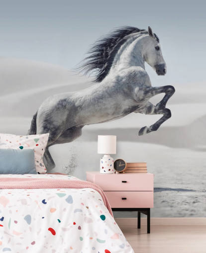 Leaping White Horse in Snowy Landscape Wallpaper