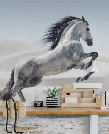 Leaping White Horse in Snowy Landscape Wallpaper