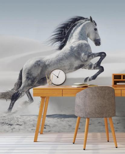 Leaping White Horse in Snowy Landscape Wallpaper