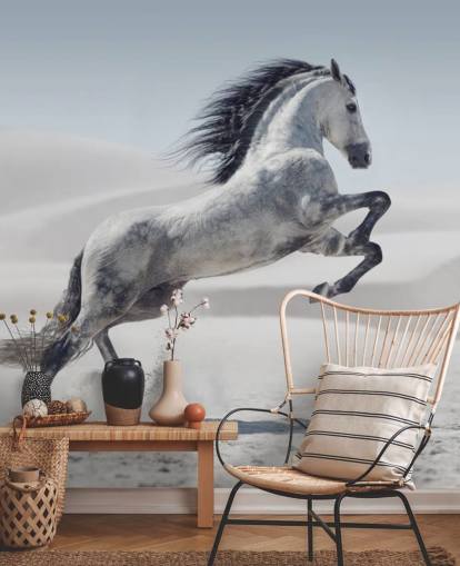 Leaping White Horse in Snowy Landscape Wallpaper