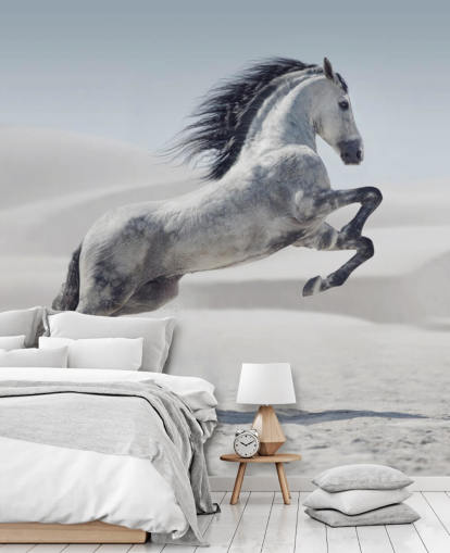Leaping White Horse in Snowy Landscape Wallpaper