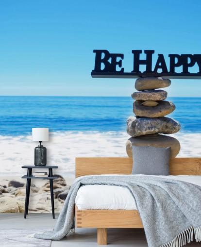 Firme Be Happy en rocas equilibradas