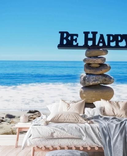 Sign Be Happy on balanced rocks