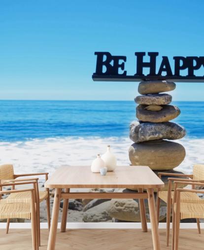 Sign Be Happy on balanced rocks