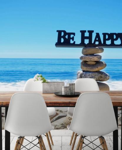 Sign Be Happy op gebalanceerde rotsen