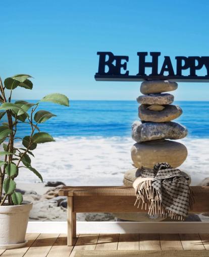 Firme Be Happy en rocas equilibradas