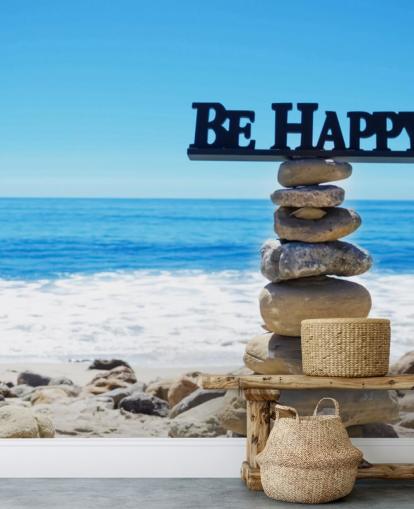 Firme Be Happy en rocas equilibradas