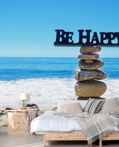 Firme Be Happy en rocas equilibradas