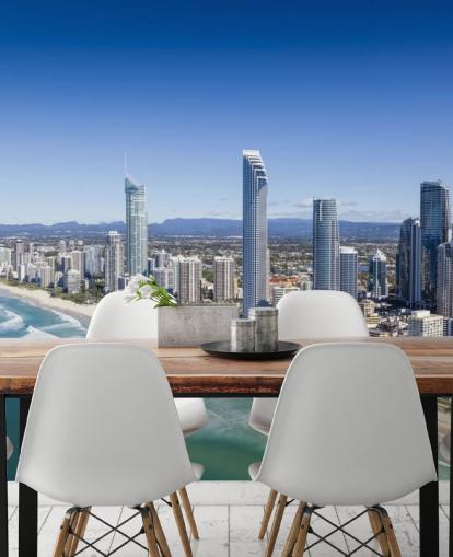 long stretch of beach next to city wallpaper