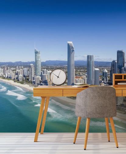 long stretch of beach next to city wallpaper