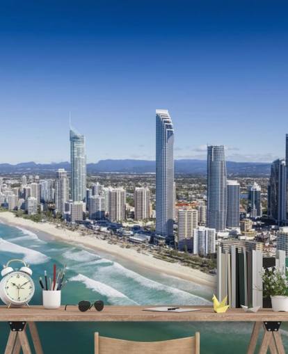 long stretch of beach next to city wallpaper