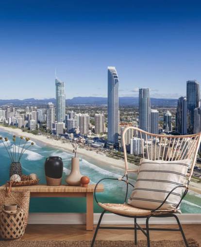 long stretch of beach next to city wallpaper