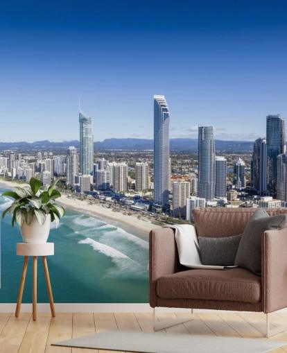 long stretch of beach next to city wallpaper