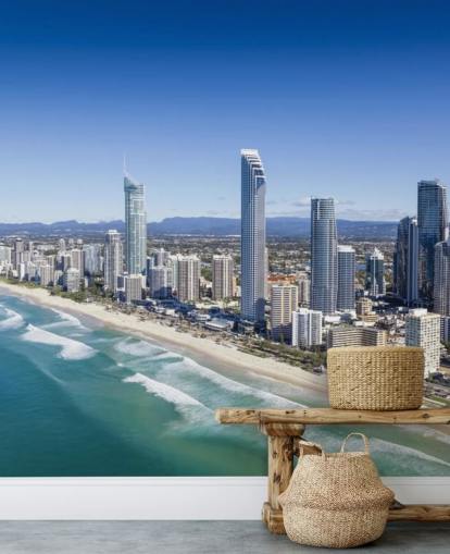 long stretch of beach next to city wallpaper