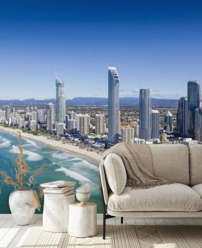 long stretch of beach next to city wallpaper