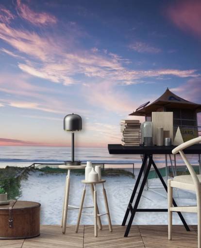 Rettungsschwimmerhütte am Strand bei Sonnenuntergang Fototapete