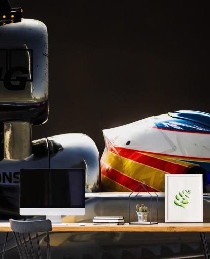 F1-kuljettajan sivuprofiili auton taustakuvassa