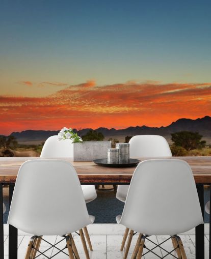 Paisaje al atardecer con elefantes fondo de pantalla