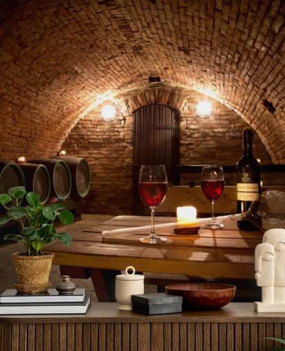 Papier peint Cave à vin confortable avec deux verres de vin rouge
