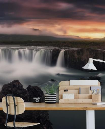 Fondo de pantalla de cascada y puesta