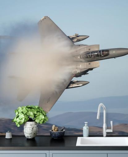 Fighter fly i Cloud Bakgrunn