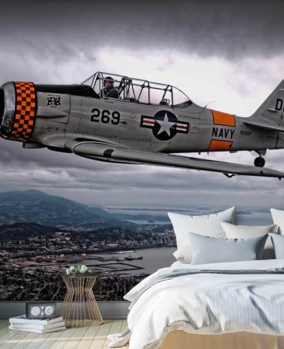 Papel pintado de avión Hellcat volador sobre la costa