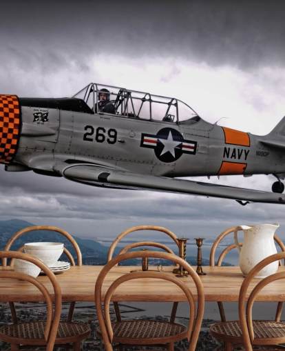 Flying Hellcat Plane Above the Coast Wallpaper