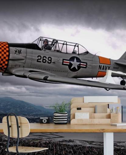 Fliegendes Hellcat-Flugzeug über der Küste Tapete Fliegendes Hellcat-Flugzeug über der Küste Tapete