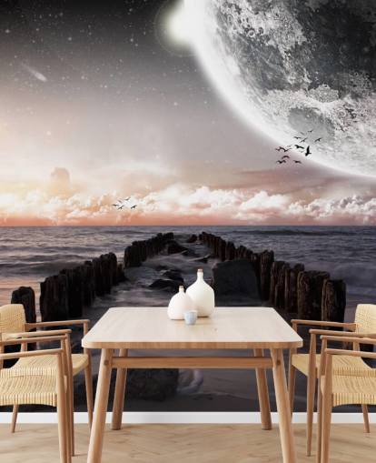 beach at night with large moon wallpaper