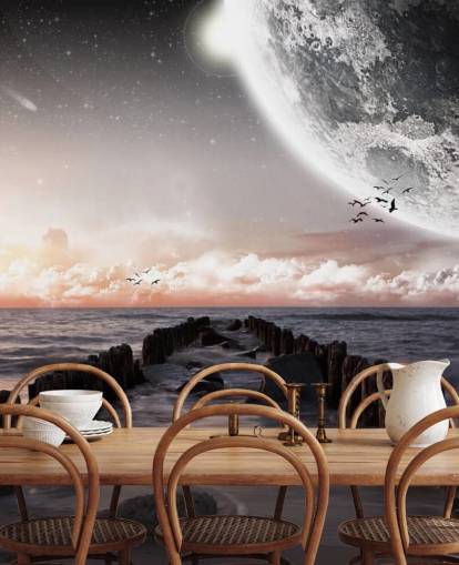 beach at night with large moon wallpaper