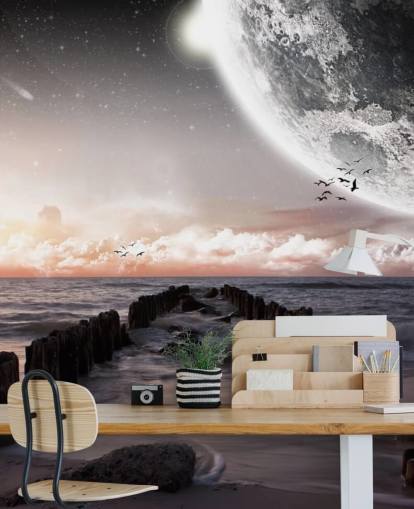 beach at night with large moon wallpaper