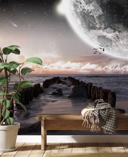 beach at night with large moon wallpaper